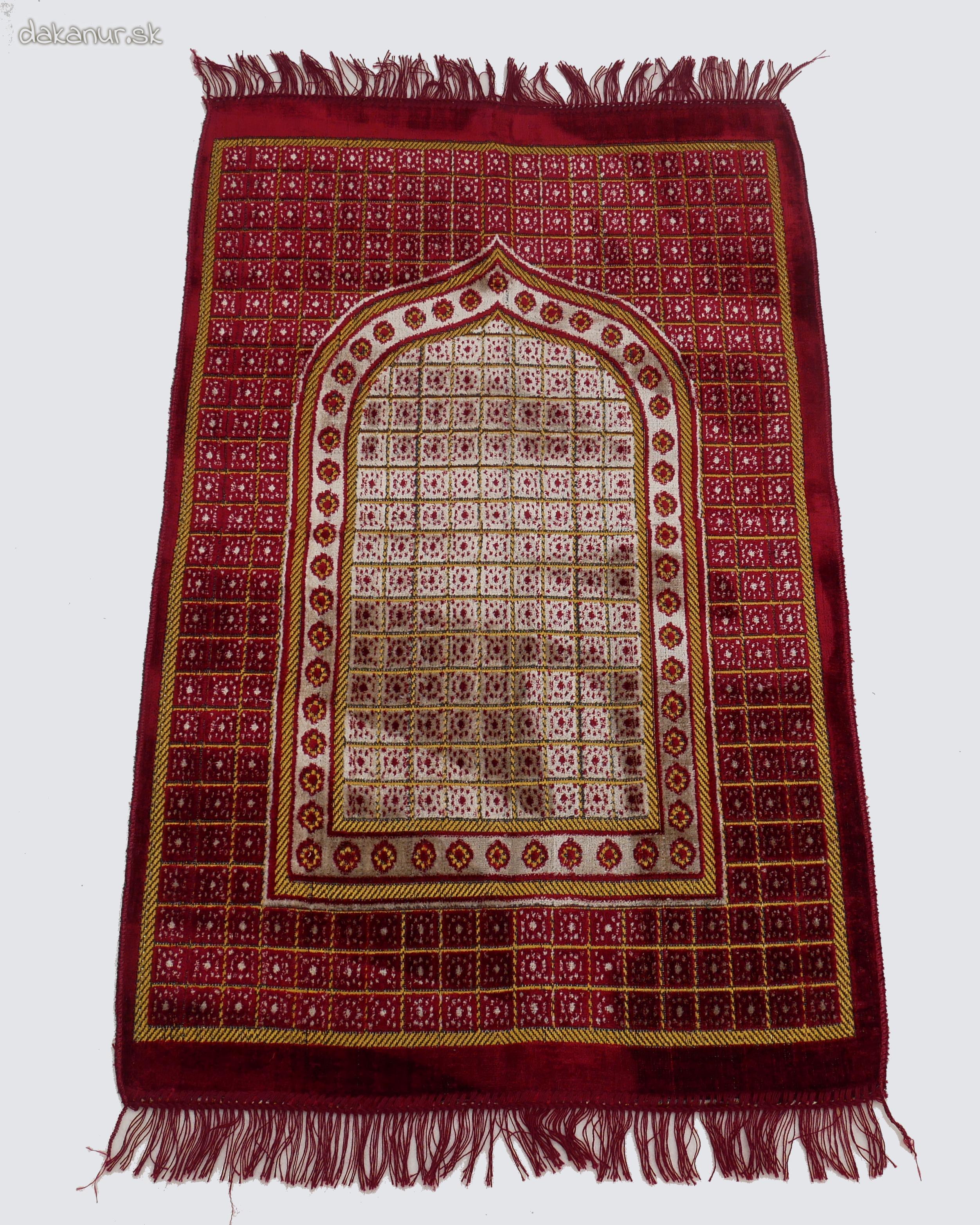 Červený modlitebný koberec