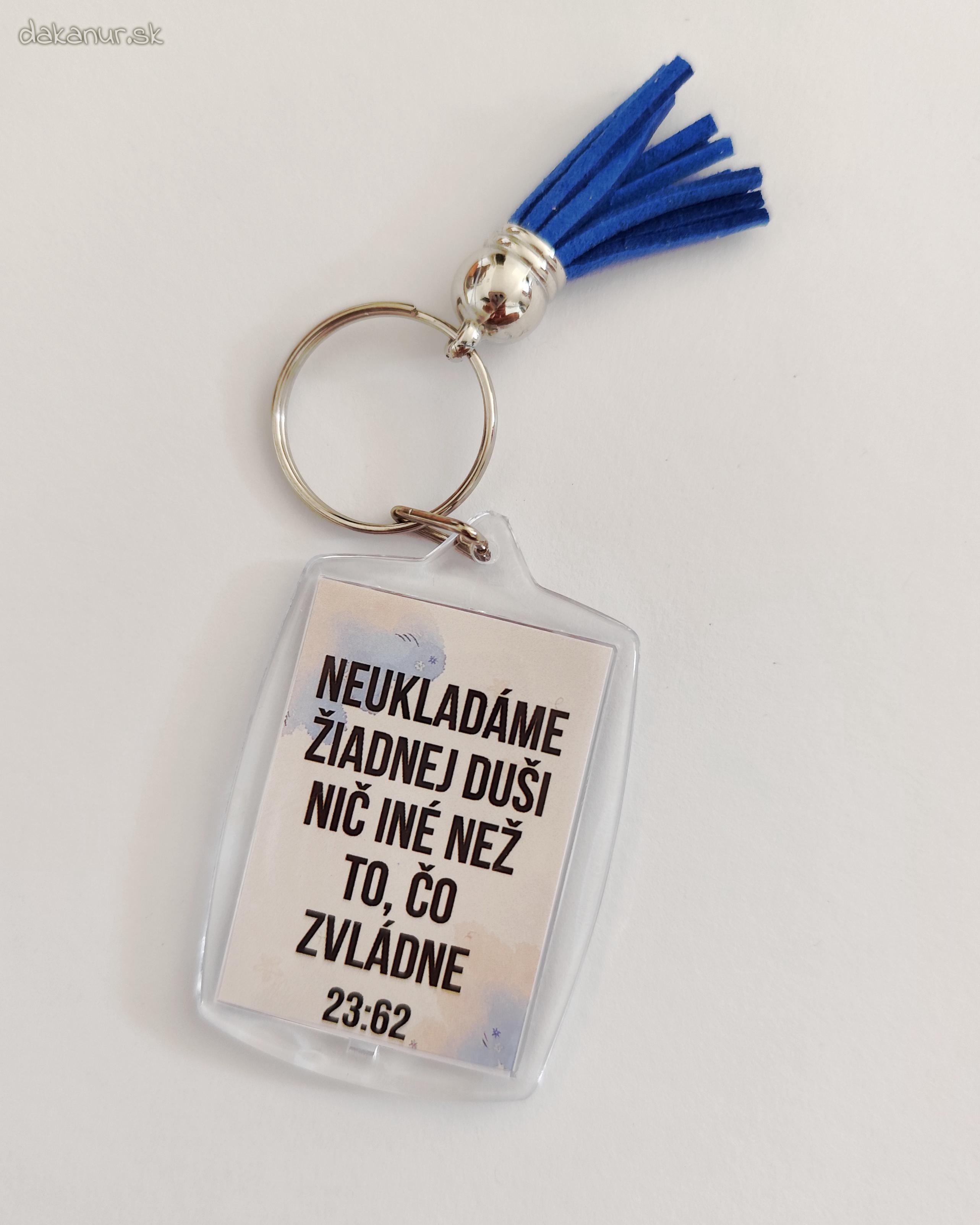 Prívesok s citátom z Koránu 23:62